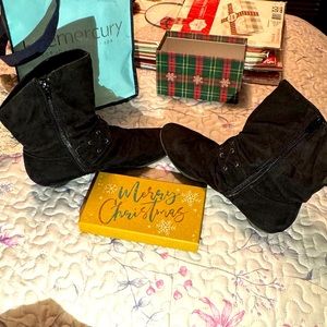 Black suede ankle boots with low heel and lots of style.